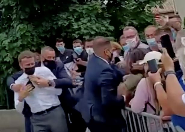 Security stepped in after French President Emmanuel Macron was struck