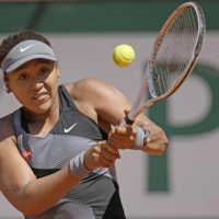 Naomi Osaka, seen during the first round of the French Open in May, will not be competing at Wimbledon this year.  | AP / VIA KYODO