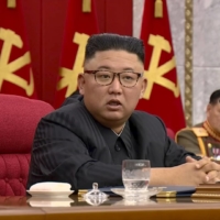 North Korean leader Kim Jong Un speaks at meeting of senior Workers' Party of Korea officials on June 16.  | KRT TV / VIA REUTERS