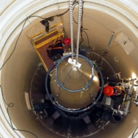 A U.S. Air Force missile maintenance team removes the upper section of an intercontinental ballistic missile with a nuclear warhead at Malmstrom Air Force Base, Montana. | USAF / VIA REUTERS