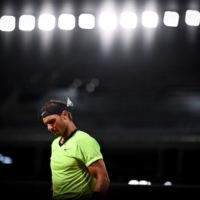 Spain's Rafael Nadal plays on Day 5 of the French Open in Paris on June 3. | ANNE-CHRISTINE POUJOULAT / AFP-JIJI