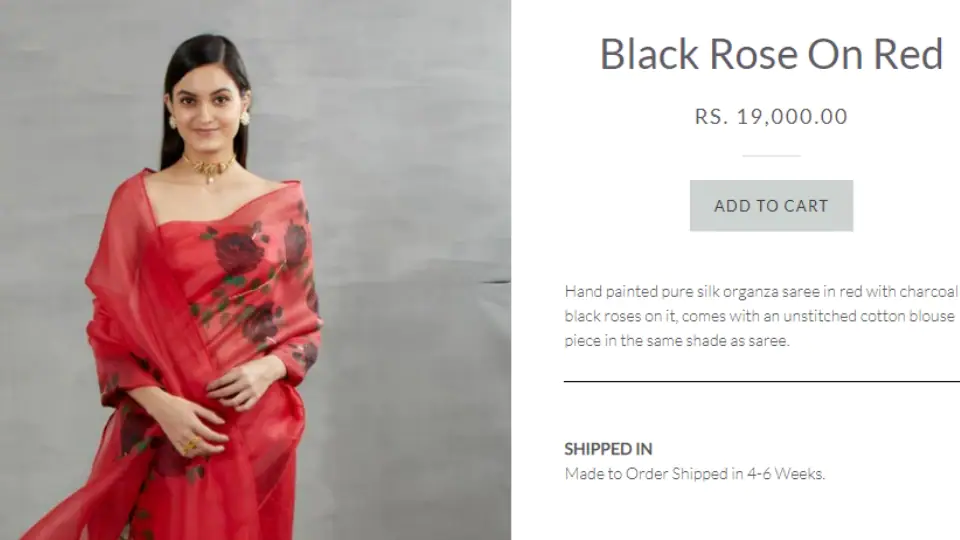 The black on rose red saree. (picchika.in)