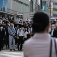 Tokyo confirmed 439 new cases of COVID-19 on Thursday. | BLOOMBERG