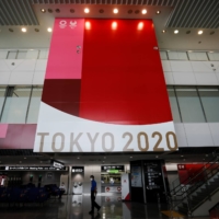 An advertisement for the Tokyo 2020 Olympic and Paralympic Games at Narita International Airport in Chiba Prefecture last week |  REUTERS