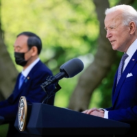 U.S. President Joe Biden holds a joint news conference with Japanese Prime Minister Yoshihide Suga in the Rose Garden at the White House on April 16.  | REUTERS