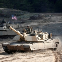 U.S. Army tanks attend a NATO military exercise in Adazi, Latvia, on March 26. | REUTERS