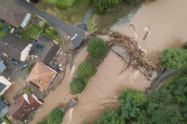 An aerial view shows a bridge damaged by trunks following heavy rains and flood in Echtershausen, near Bitburg