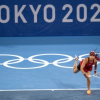 Japan's Naomi Osaka is seen during her match against Marketa Vondrousova of the Czech Republic, in the third round of the women’s singles tennis tournament at Ariake Tennis Park in Tokyo on Tuesday. | DOUG MILLS/THE NEW YORK TIMES