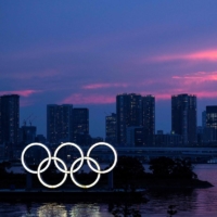 The spreading infections in Tokyo highlight the risks of staging the world's biggest sports event during a pandemic even without spectators in venues. | AFP-JIJI