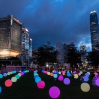 A light show marks the centenary of the Chinese Community Party and the anniversary of Hong Kong's return to Chinese rule at Tamar Park in Hong Kong, China, on Thursday, July 1. | BLOOMBERG