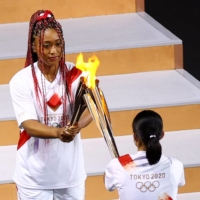 Naomi Osaka is the first tennis player to light the Olympic cauldron. | REUTERS