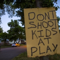 This sign was put up by residents in the Englewood area of Chicago in the hopes of reducing the high incidence of gun violence in the neighborhood. | REUTERS