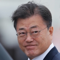 The likelihood of a visit by South Korea's President Moon Jae-in to Tokyo for the Olympics has been a matter of debate in recent weeks. | POOL / VIA REUTERS