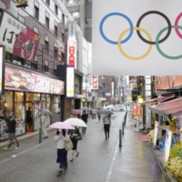 Tokyo's Shimbashi district on Friday. A group of citizens in Japan sought a court injunction on Friday to halt the upcoming Tokyo Olympics and Paralympics.  | KYODO