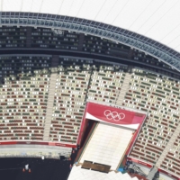 Most games at the Tokyo Olympics will be held without spectators, forcing the organizers to face uninsured losses from ticket sales. | KYODO