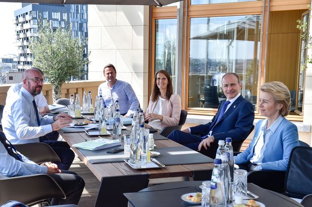 Belgium's Prime Minister Sophie Wilmes (C) attends a meeting with Luxembourg's Prime Minister Xavier Bettel (L), Ireland's Taoiseach Micheal Martin (2nd R), European Council President Charles Michel (L), European Commission President Ursula von der Leyen (R) during a European Union leaders summit