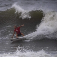 Australia's Owen Wright rides a wave during the men's surfing third round at Tsurigasaki Surfing Beach in Chiba on Monday during the Tokyo 2020 Olympic Games. | AFP-JIJI