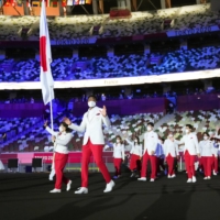 Japan's delegation marches during the opening ceremony of the Tokyo Olympics at the National Stadium on Friday. | KYODO