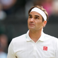 
FILE PHOTO: JUL 7, 2021; LONDON, UNITED KINGDOM; ROGER FEDERER (SUI) PLAYS AGAINST HUBERT HURKACZ (POL) IN THE QUARTER FINALS AT ALL ENGLAND LAWN TENNIS AND CROQUET CLUB. MANDATORY CREDIT: PETER VAN DEN BERG-USA TODAY SPORTS/FILE PHOTO