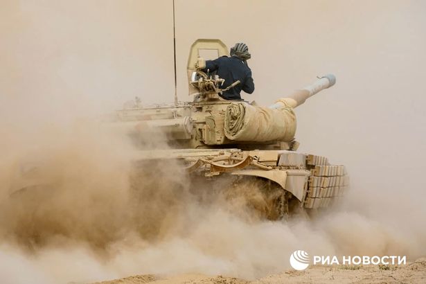 Russian tanks stationed at a base in Tajikistan have arrived at training grounds near the border with Afghanistan ahead of army drills next month.