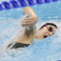 Swimmer Rikako Ikee competes in her 4x100-meter freestyle relay heat at the Tokyo Olympics on Saturday. | KYODO