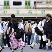 Crowded streets near Tokyo's Shibuya Station on Thursday, despite rising COVID-19 numbers | KYODO