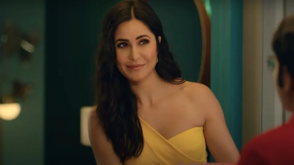 Katrina Kaif in a one-shoulder yellow dress.(YouTube/Zomato)