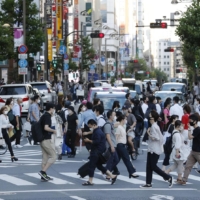 Tokyo reported 5,534 new cases of COVID-19 on Thursday. | KYODO