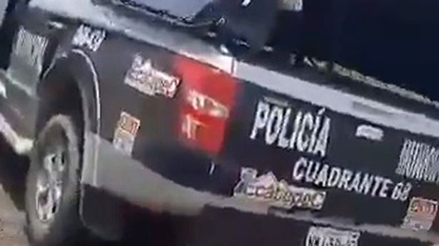 Two police officers in uniform were caught having sex in a police vehicle in public in Mexico