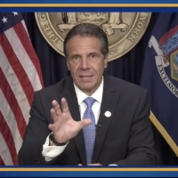 New York Gov. Andrew Cuomo gives an address on Tuesday. Cuomo said he would resign from office in 14 days, succumbing to a ballooning sexual harassment scandal that fueled an astonishing reversal of fortune for one of the nation's best-known leaders. | OFFICE OF THE NEW YORK GOVERNOR / VIA THE NEW YORK TIMES