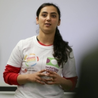 Khalida Popal speaks during a motivational session with young women in London in 2018. | AFP-JIJI