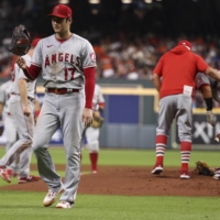 Los Angeles Angels starting pitcher Shohei Ohtani walks off the mound after a pitching change in the fourth inning against the Houston Astros on Friday.  | USA TODAY / VIA REUTERS