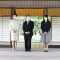 Emperor Naruhito, Empress Masako and Princess Aiko at the imperial residence in the Imperial Palace in Tokyo on Monday | KYODO