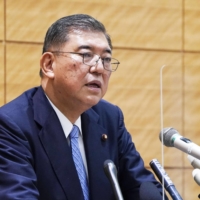 Shigeru Ishiba, former secretary-general of the Liberal Democratic Party, speaks during a news conference at the Diet building on Wednesday. | KYODO