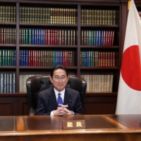 Former Foreign Minister Fumio Kishida poses at the Liberal Democratic Party headquarters after he was elected as the party president in Tokyo on Wednesday. | POOL / VIA REUTERS