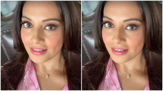 Bipasha accessorised her look with a golden pendant bearing the initials of her name.(Instagram/@bipashabasu)