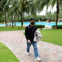 A South Korean tourist walks away from a swimming pool at the Vinpearl Resort on Vietnam's Phu Quoc island on Saturday.  | AFP-JIJI