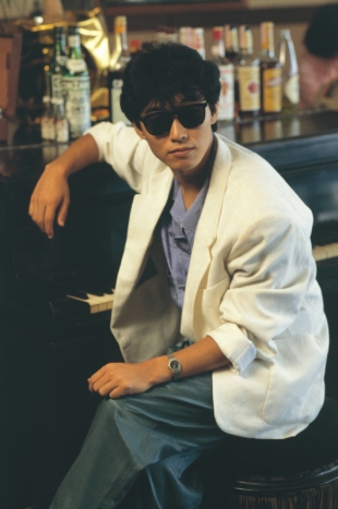 Singer/songwriter Kiyotaka Sugiyama's lively dancing onstage and signature sunglasses have become a pop culture reference point for Japan's 1980s bubble era.