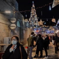 A street in the Old City of Jerusalem on Dec. 19. Israel’s strict border controls have largely barred foreign tourists from entry. | AMIT ELKAYAM  / THE NEW YORK TIMES