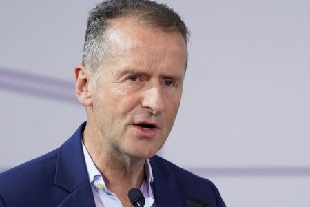 Herbert Diess stays on to steer VW into electric future