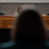 U.S. Senate Foreign Relations Committee Chairman Bob Menendez (left) and Sen. Jim Risch during a hearing to examine U.S.-Russia policy on Dec. 7. | AFP-JIJI