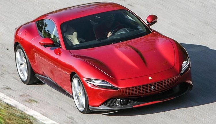 Ferrari signals higher profits this year after record 2021