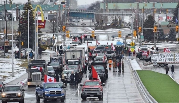 U.S.-Canada bridge closure cost auto industry millions of dollars. Who pays?