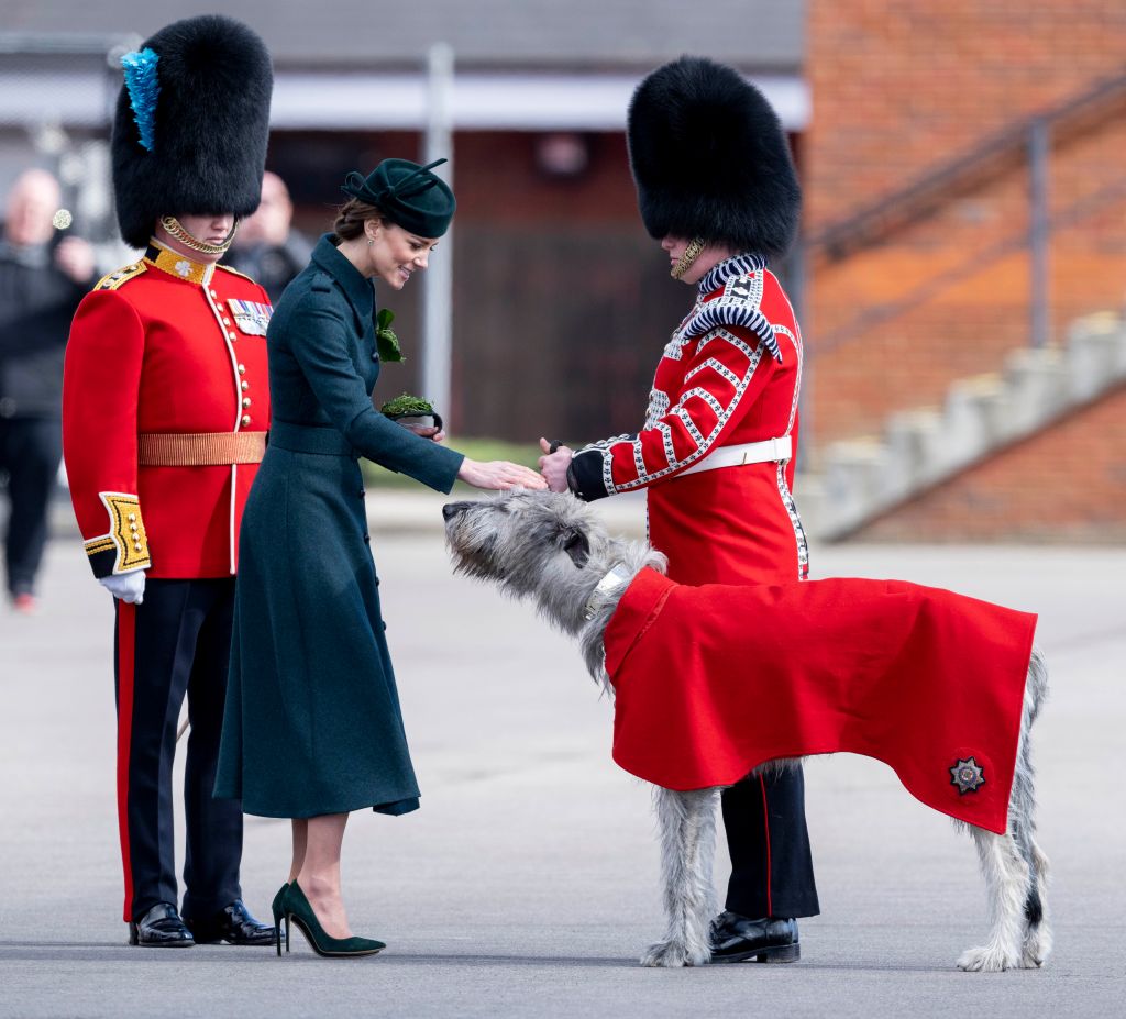 ALDERSHOT, ENGLAND – MARCH 17: Catherine, Duchess of Cambridge is guests of honour at this years Irish Guards St Patricks Day Parade held at the home to 1st Battalion Irish Guards, Mons Barracks on March 17, 2022 in Aldershot, England. Their Royal Highnesses presented the traditional sprigs of shamrock to the Officers and Guardsmen. (Photo by Mark Cuthbert/UK Press via Getty Images)