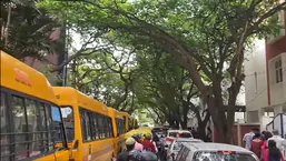 Long queue of school vehicles on the 12th main road in Indiranagar area of Bengaluru. 