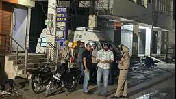 Police outside Hotel Relax Inn in Baltana, Zirakpur, following the shootout on Sunday night. (HT Photo)