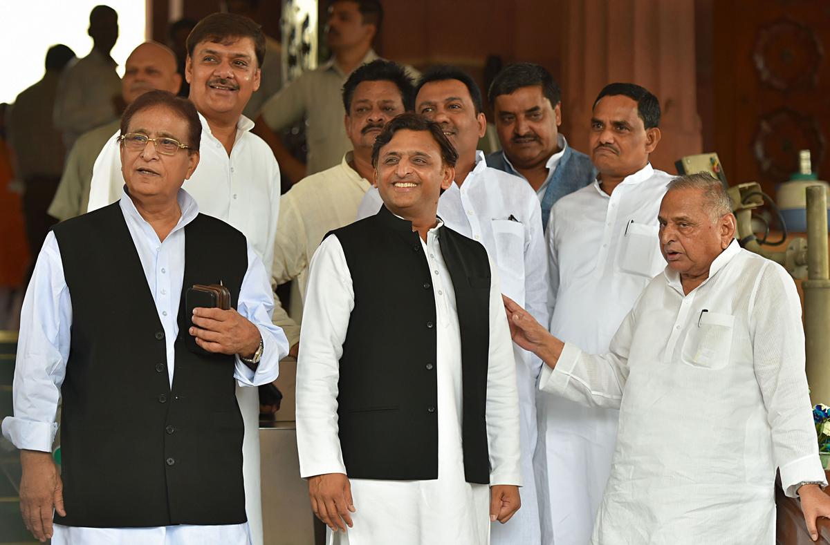 Samajwadi Party founder Mulayam Singh Yadav with his son and party president Akhilesh Yadav and MP Azam Khan on the opening day of the the first session of the 17th Lok Sabha at Parliament House in New Delhi on June 17, 2019. 