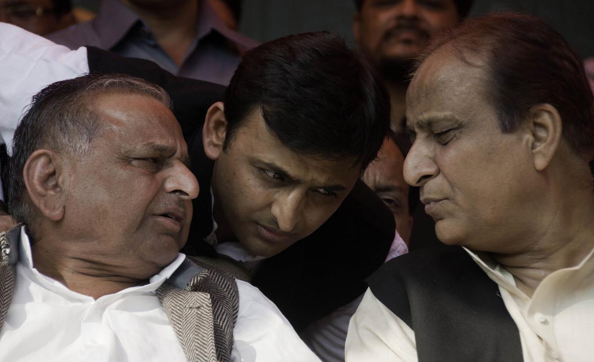 Samajwadi Party president Mulayam Singh Yadav, his son Akhilesh Yadav and Azam Khan at a party meeting after Mr. Khan returned to the party fold following his expulsion, in Lucknow on December 04, 2010.