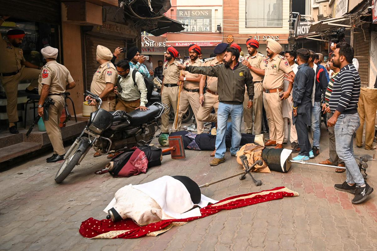 Supporters of Sudhir Suri ask shopkeepers to close their shops.