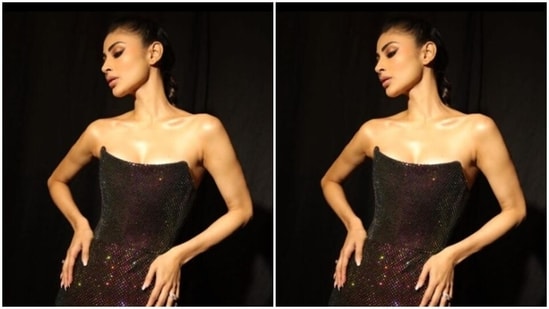 Mouni's off-shoulder gown featured a long train at the back, and bodycon details as it hugged Mouni's shape perfectly and showed off her curves.(Instagram/@imouniroy)